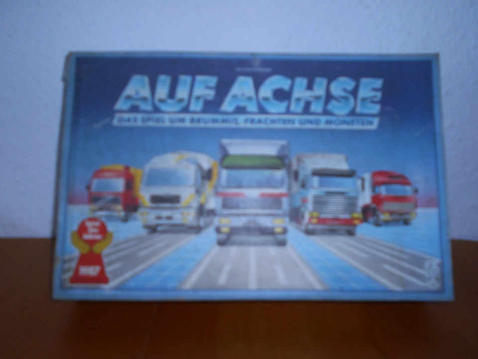FX Schmid - AUF ACHSE Das Spiel um Brummis, Frachten und Moneten 🎲 Vintage 1987 - Bild 1 von 4