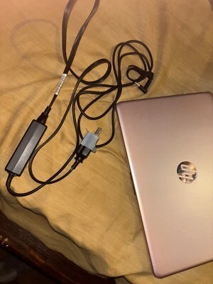 PINK USED HP LAPTOP COMPUTER ( comes with charger included) - Image 1 of 4