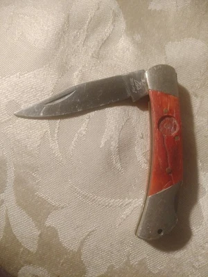 Cuchillo plegable vintage Frost Cutlery Trapper. Mango de hueso naranja. 440SS Foto 1 de 4