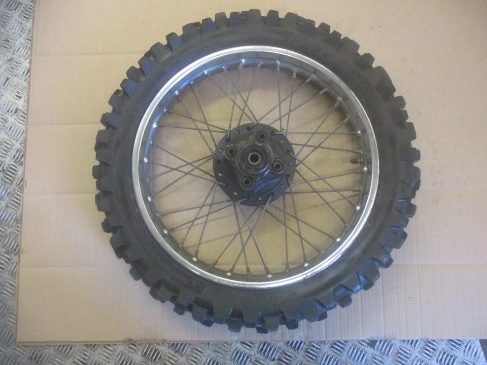 Roue arrière avec pneu Michelin en bon état pour Honda 125 XLS - XR - Photo 1/4