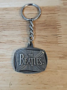 LLAVERO PELTRE BEATLES 1996 APPLE CORPS LIMITED - Imagen 1 de 4