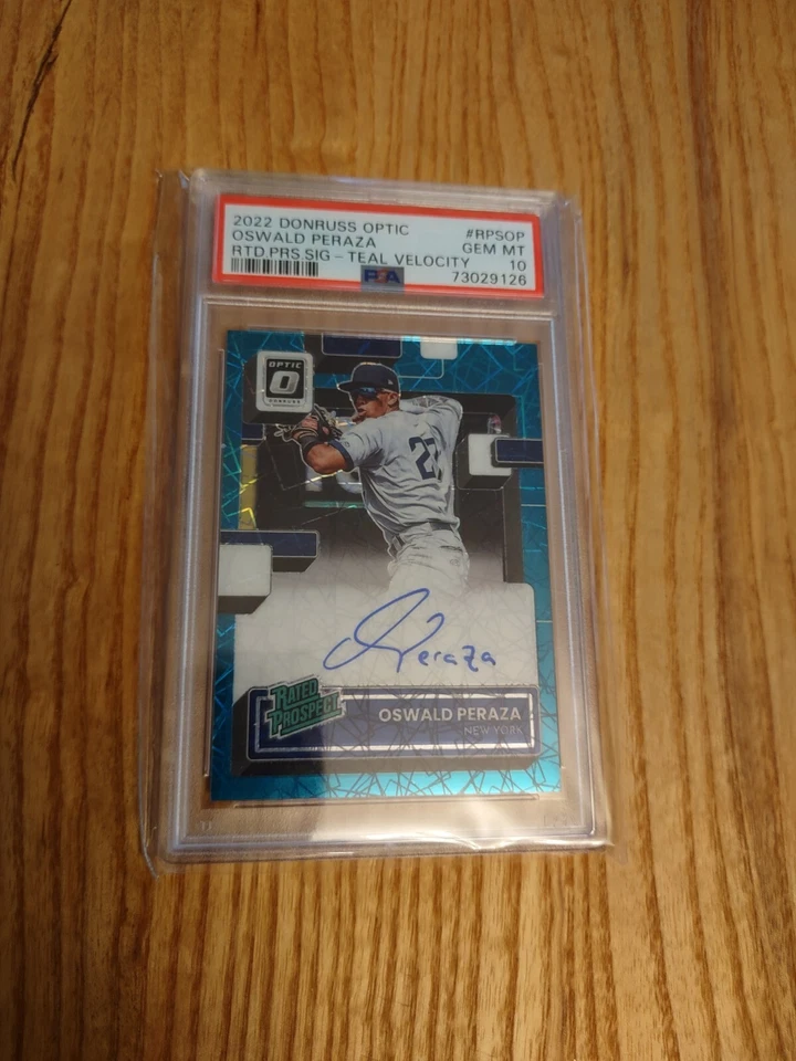 2022 Panini Donruss Optic Oswald Peraza TEAL VELOCITY HOLO PSA 10 AUTO 16/25 - Image 1 of 4
