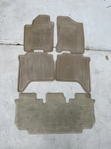 2003-2015 Nissan Armada Pathfinder Tan floor mats rubber OEM full set Qx56 Titan - Picture 1 of 14