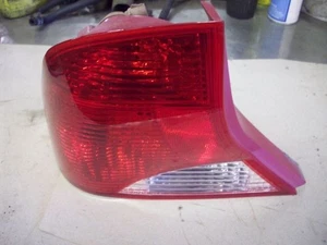 DRIVER LEFT TAIL LIGHT SEDAN THRU 1/22/01 FITS 00-01 FOCUS 149492 - Picture 1 of 2