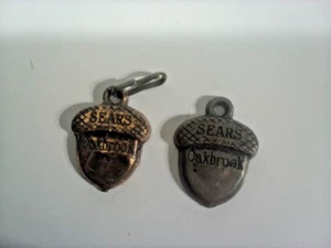Lot Of 2 Sears Oakbrook Acorn Royce NY Metal Zipper Pull 1 Cooper 1 Nickle VTG - Picture 1 of 3