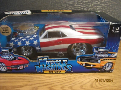 1/18   1966  PONTIAC GTO , FLAG GRAPHCS   BY FUNLINE "MUSCLE MACHINES" # 71166 - Image 1 of 4