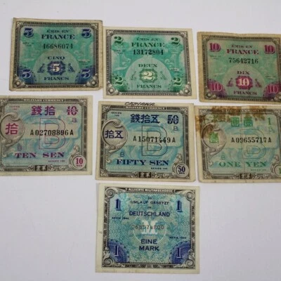 Group of 7 WWII Military Currency Notes - American, German, and French - Image 1 of 4