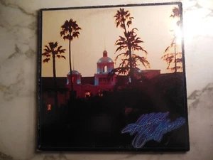 EAGLES HOTEL CALIFORNIA VINYL LP ALBUM ASYLUM 6E-103 STERLING - Imagen 1 de 9