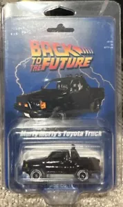 #1:64 Back To The Future Marty’s 85 Toyota Hilux Extended Pickup Truck - Picture 1 of 6
