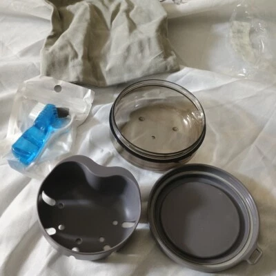 Juego dispensador portátil de agua y alimentos para mascotas Foto 1 de 2