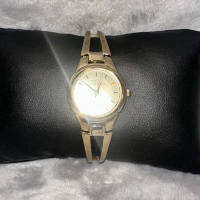 Reloj pulsera cerámica para mujer Anne Klein 10/9816 tono dorado Foto 1 de 4