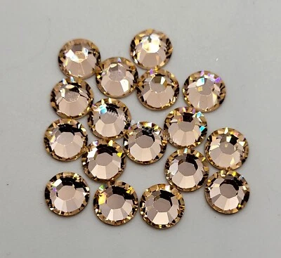 12 piezas Cristal Swarovski Luz Melocotón SS34 7mm Estrás Plano Redondo Estrás 2028 Foto 1 de 2