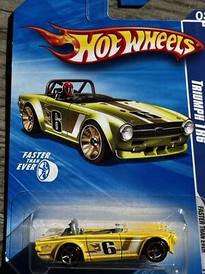 Triumph TR6 1968 amarillo FTE KMart Hot Wheels HW más rápido que nunca 3/10 131 Foto 1 de 4