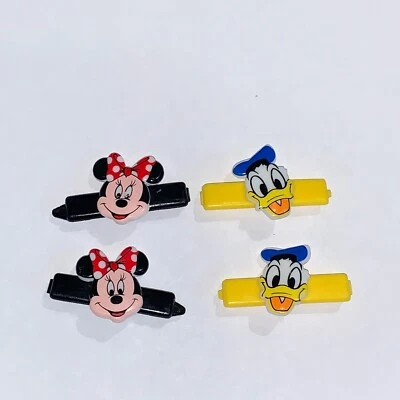 Lote de pasadores de plástico vintage Goody niños niñas pinzas para el cabello Minnie Donald Disney Foto 1 de 3
