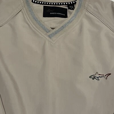 Chaqueta cortavientos de golf Greg Norman Everbest para hombre suéter pequeño tostado cuello en V Foto 1 de 4