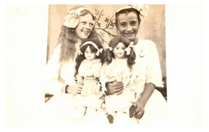 Two Young Girls Holding Dolls Real Photo Postcard - Picture 1 of 2