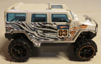 Hot Wheels Hummer White SUV Die Cast Toy 1:64 Scale TM GM Zebra Print Loose Toy - Image 1 of 4