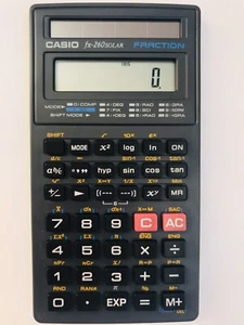 Calculadora de fracciones científica solar Casio FX-260 con cubierta deslizante probada - Imagen 1 de 6