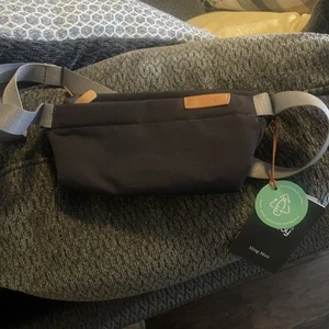 Bellroy Mini Sling Bag in black with gray strap, Zipper Pockets Adjustable Strap - Picture 1 of 6