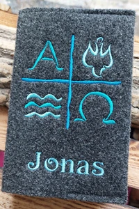 Gotteslob-Hülle mit Namen Kreuz Kommunion alpha omega Welle..dunkelgrau türkis - Bild 1 von 2