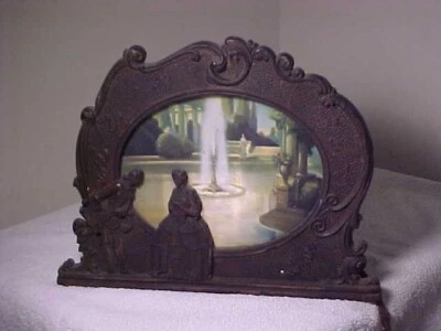 Antigua lámpara de movimiento de hierro luz de mesa cascada victoriana escena animada Foto 1 de 4