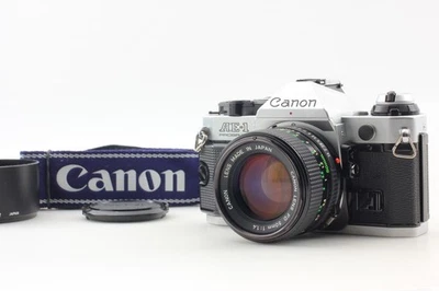 [Ecc + 5 con cappuccio] Programma Canon AE-1 Nuovo obiettivo fotocamera... - Immagine 1 di 4
