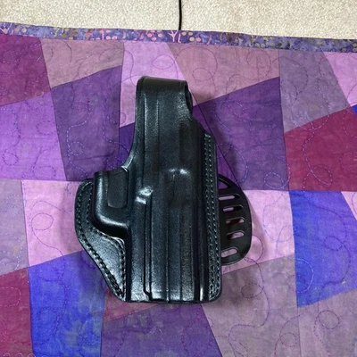 Gould & Goodrich Funda QKA C40 Funda Paleta Derecha Glock 19, Ruger, P220 Foto 1 de 4