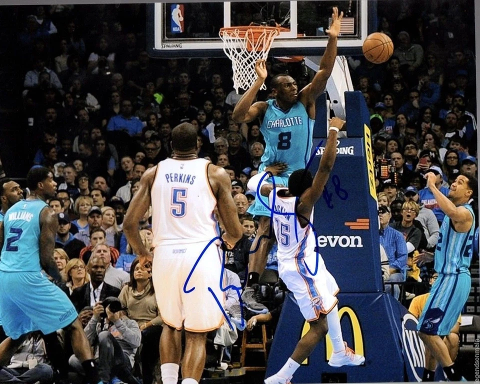 Bismack Biyombo Hornets Signed Autographed  8x10 Photo With LOM COA (PH2911) - Image 1 of 2