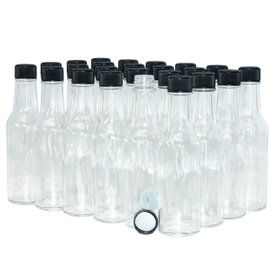 5 oz. Botella de salsa caliente de vidrio transparente con tapa forrada de espuma negra y reductor de orificio Foto 1 de 4