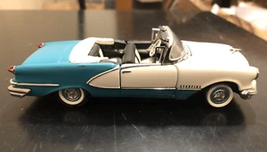 Coche modelo fundido a presión Oldsmobile Starfire 1956 Franklin Mint - escala 1/43 - Imagen 1 de 9