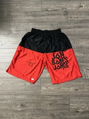 ¡OFERTA! TRONCOS DE BOXEO ROJOS AUTOGRAFIADOS POR JON BONE JONES BECKETT BAS CERTIFICADO DE AUTENTICIDAD Foto 1 de 3