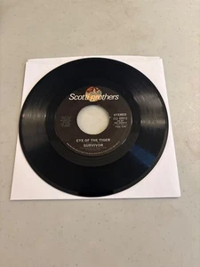 SURVIVOR EYE OF THE TIGER / TAKE YOU ON A SATURDAY 7" VINYL 45 RPM TESTED VG+ - Picture 1 of 2