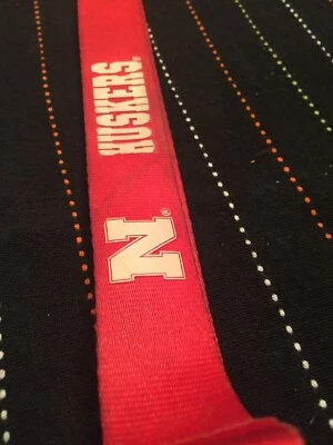 NCAA Nebraska Corn Huskers, Red & White Lanyard-used Only A Few Times - Image 1 of 4