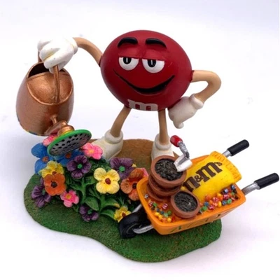 Danbury Mint M&M's Perpetual Calendar Red M&M May Watering Garden Flowers Figure - Image 1 of 4