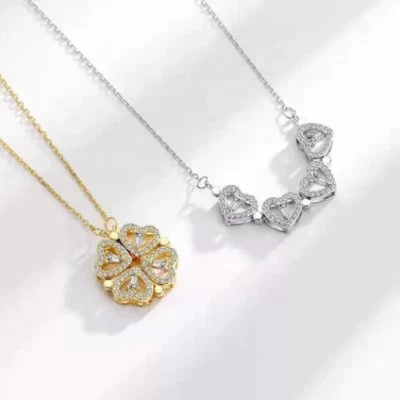 COLLANA QUADRIFOGLIO TRASFORMABILE IN SERIE DI CUORI CON ZIRCONI ACCIAIO PL. ORO - Immagine 1 di 3