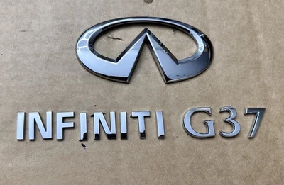 INFINITI G37 COUPE Convertible 2 DOOR Rear Trunk Lid Emblem Logo - image 1 of 4