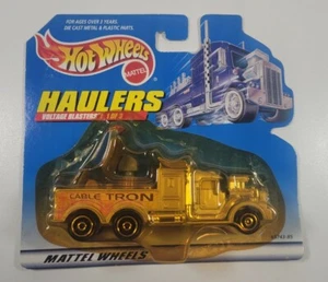 Hot Wheels Haulers Voltage Blaster Gold Cable Tron Transport Truck (1999) - Picture 1 of 2