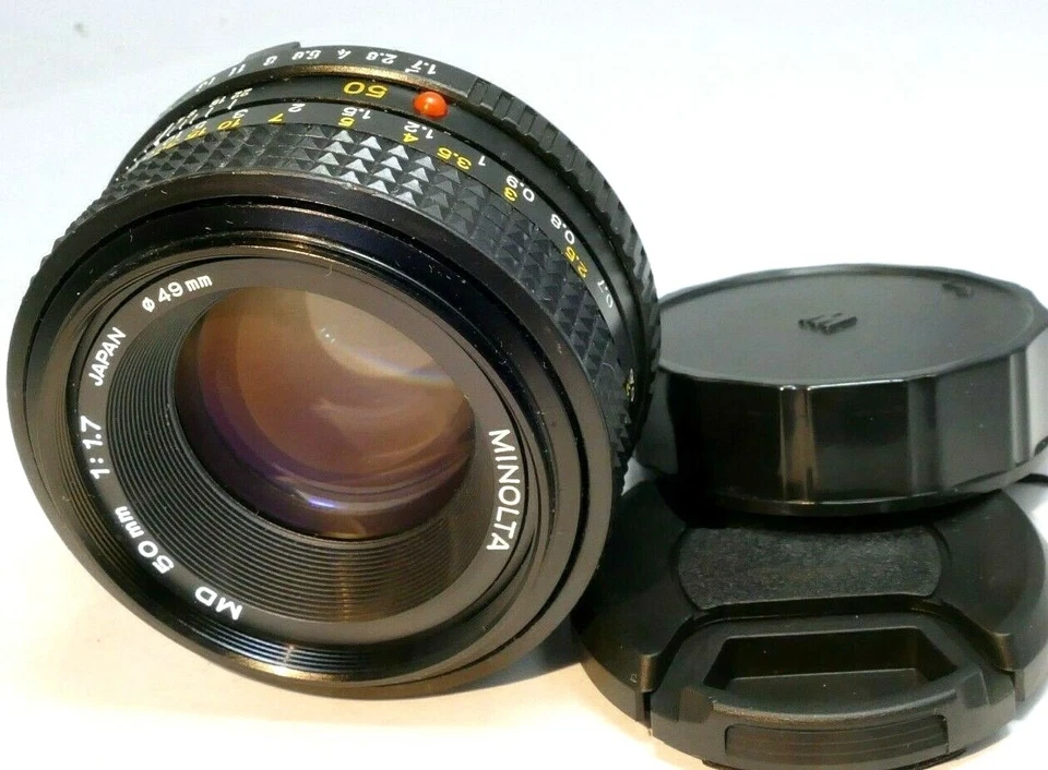 Minolta 50mm f1.7 MD manual focus with couple spots of fungus webbing works good - Image 1 of 4