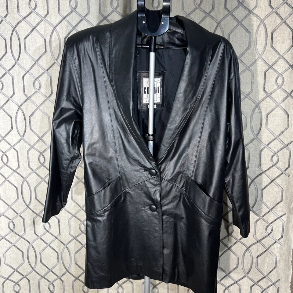 Chaqueta plumero vintage Comint de cuero negro genuino abrigo pequeño años 90 Foto 1 de 4
