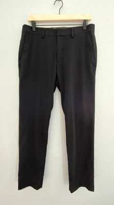 Pantalones de vestir negros Kenneth Cole Reaction para hombre frente plano talla 32x30 Foto 1 de 4