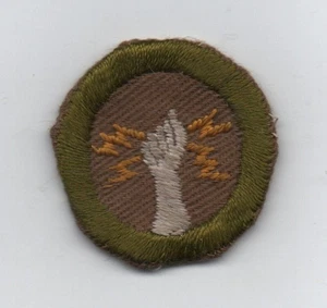Electricity Merit Badge, Type C Tan Narrow Crimped (1936-46), Used - Picture 1 of 1