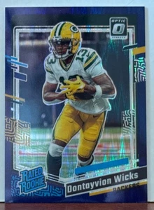 Dontayvion Wicks 2023 Panini Optic RATED ROOKIE PURPLE SHOCK #249 F11 - Picture 1 of 1
