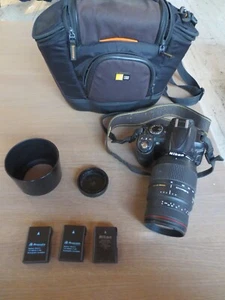 Nikon D3100 + Sigma APO DG 70-300mm 1 :4-5.6 + sac, pare soleil et 4 batteries - Photo 1/10