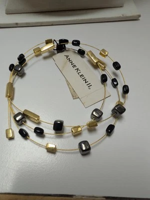 Pulsera vintage Anne Klein tono dorado cuentas negras y barras de oro nueva en stock Foto 1 de 2