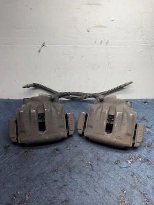 Комплект из 2 оригинальных суппортов переднего правого и левого бокового тормоза 99-06 Jaguar X100 XKR XK8 - Изображение 1 из 4