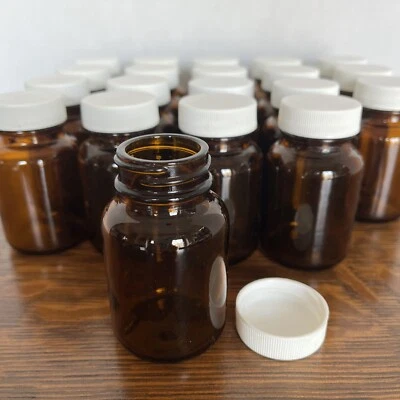 20 2oz Brown Amber Glass Pill Bottles Small Jars Round White Plastic Lids 3" - Image 1 of 4