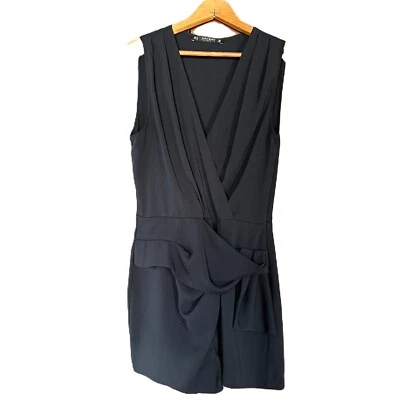 Mameluco negro plisado frontal cuello en V sin mangas pequeño negro talla pequeña de ZARA Foto 1 de 4