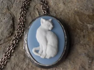 WHITE CAT CAMEO ANTIQUED SILVER PLATED LOCKET - BLUE,  CAT LOVERS GIFT - Picture 1 of 3