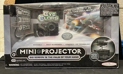 EyeClops Mini Projector Video Projector by Jakks Pacific SEALED - Image 1 of 4