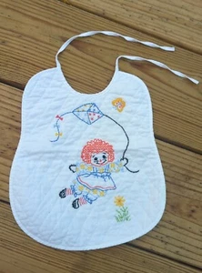 VINTAGE Hand Stitched RAGGEDY ANNE Baby Bib Quilted EMBROIDERED Cross Stitch - Picture 1 of 5